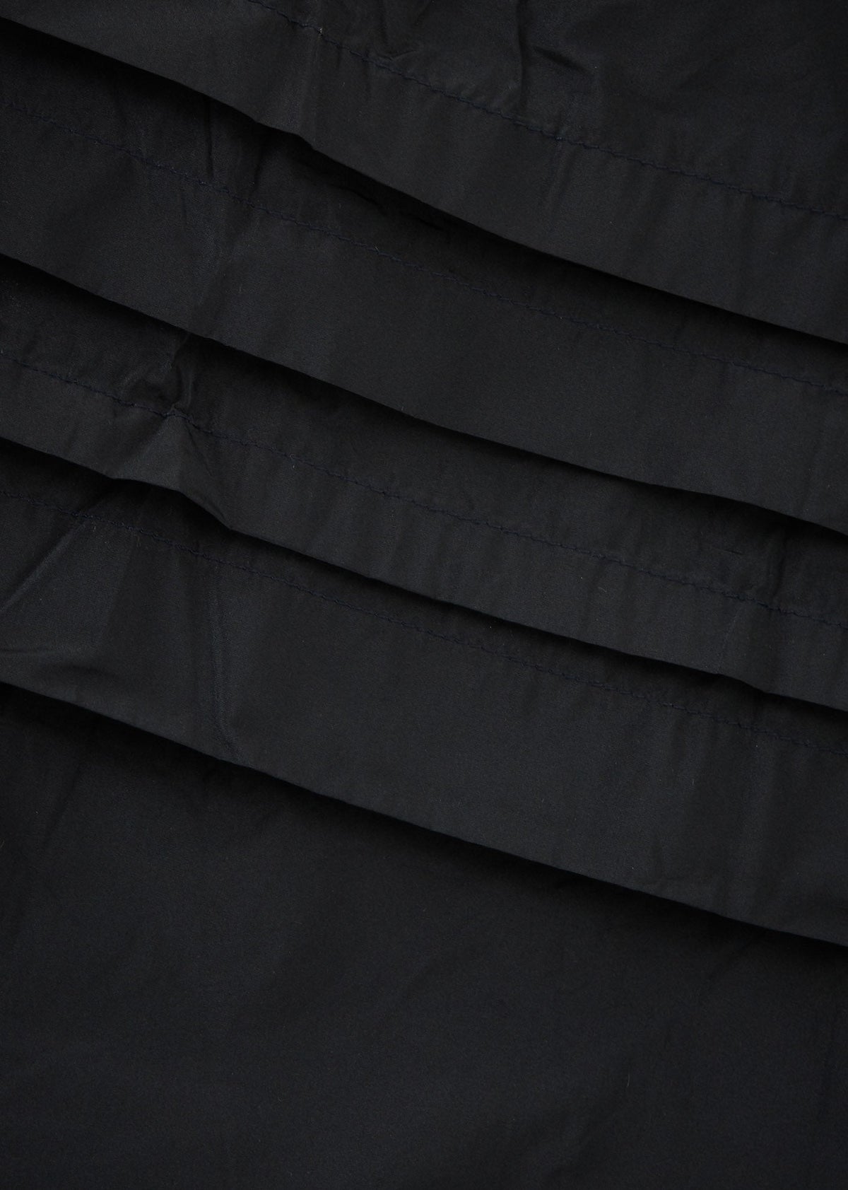 Luxury Women's Tuck Skirt Bows Black Close-uo on Pleats